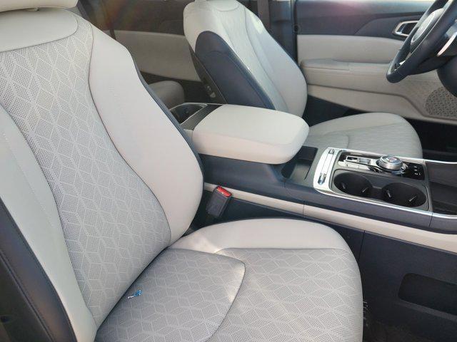 new 2025 Kia Carnival Hybrid car, priced at $47,418