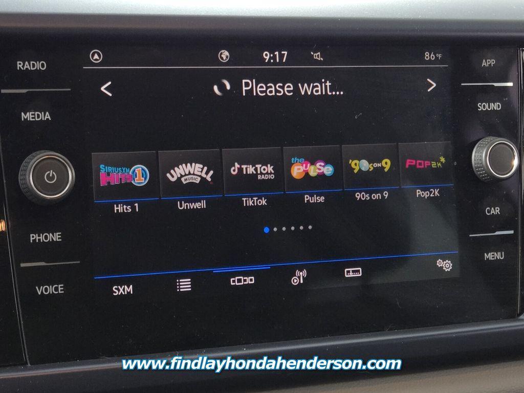 used 2023 Volkswagen Taos car, priced at $20,984