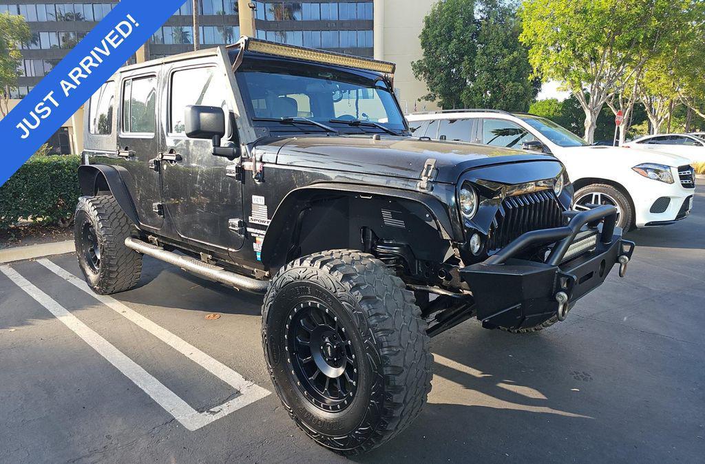 used 2016 Jeep Wrangler Unlimited car, priced at $20,984
