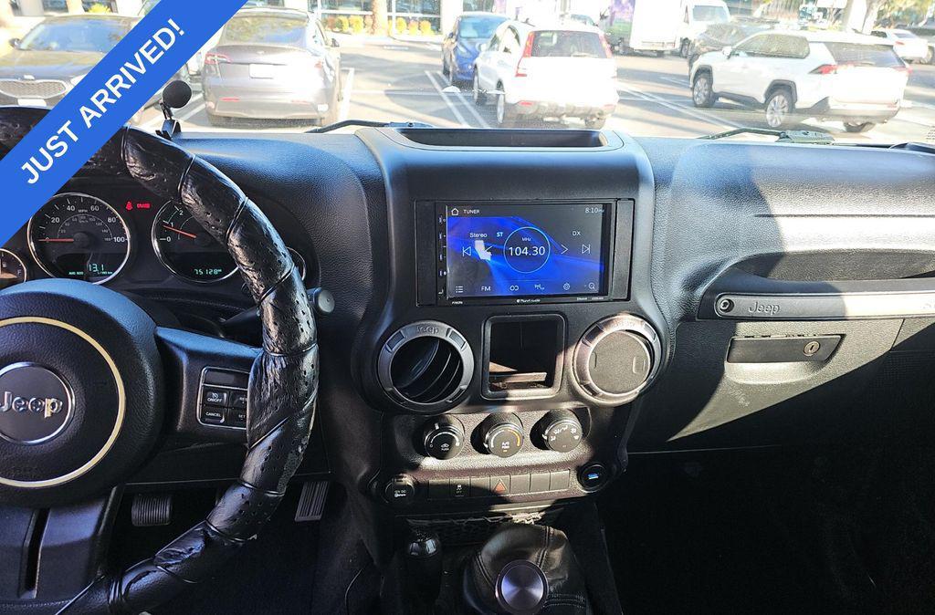 used 2016 Jeep Wrangler Unlimited car, priced at $20,984