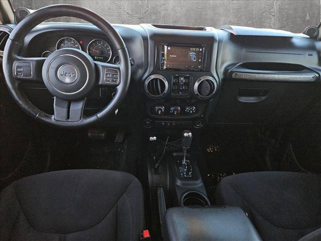 used 2014 Jeep Wrangler Unlimited car, priced at $16,795