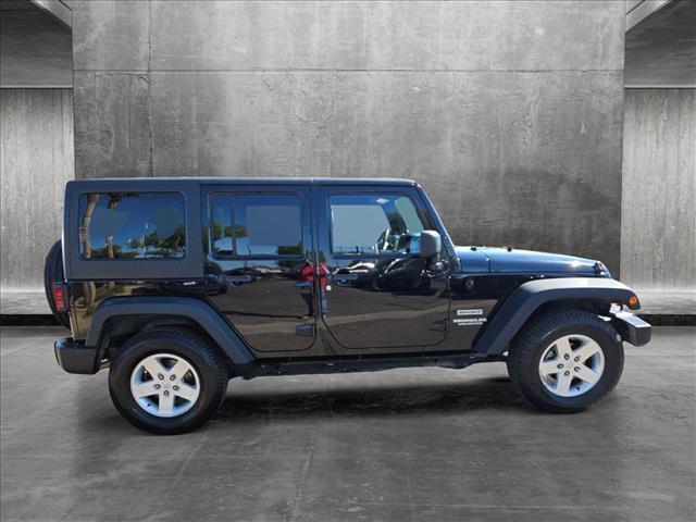 used 2014 Jeep Wrangler Unlimited car, priced at $16,795