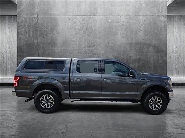 used 2018 Ford F-150 car, priced at $26,881