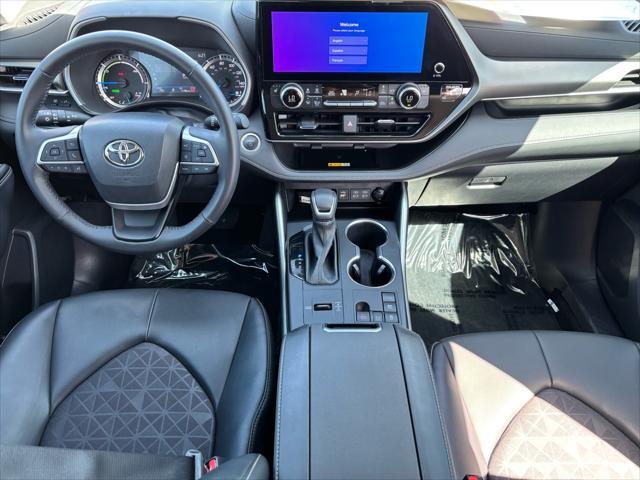 used 2024 Toyota Highlander Hybrid car, priced at $46,482