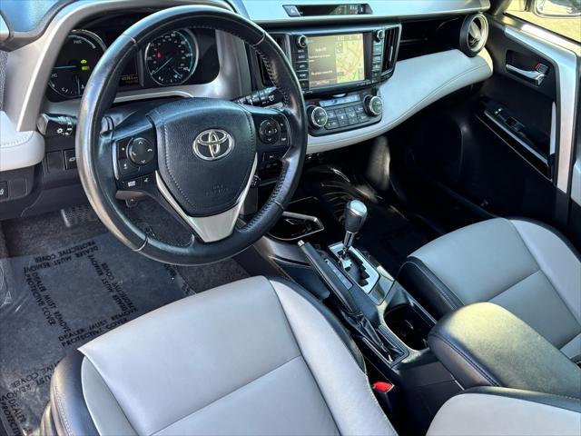 used 2018 Toyota RAV4 Hybrid car, priced at $23,591