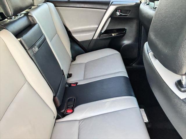 used 2018 Toyota RAV4 Hybrid car, priced at $23,657