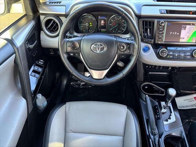 used 2018 Toyota RAV4 Hybrid car, priced at $23,657