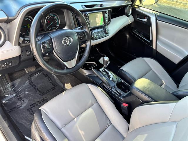 used 2018 Toyota RAV4 Hybrid car, priced at $23,657