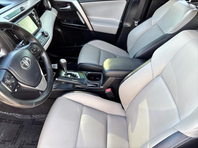 used 2018 Toyota RAV4 Hybrid car, priced at $23,657