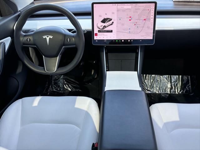 used 2021 Tesla Model Y car, priced at $28,359