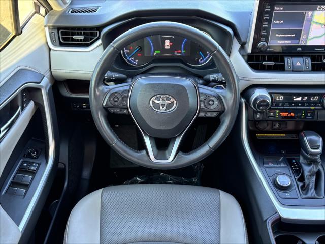 used 2019 Toyota RAV4 Hybrid car, priced at $29,714
