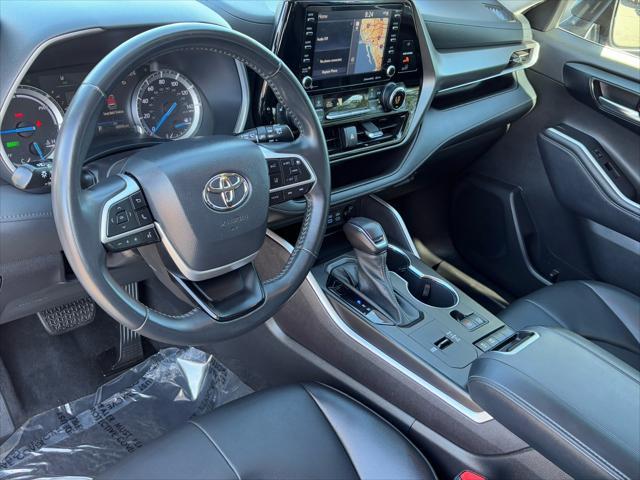used 2022 Toyota Highlander Hybrid car, priced at $38,385