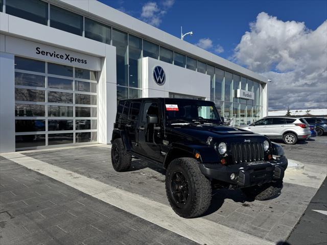 used 2012 Jeep Wrangler Unlimited car, priced at $23,490