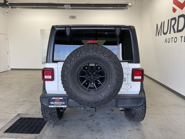 used 2021 Jeep Wrangler Unlimited car, priced at $30,750