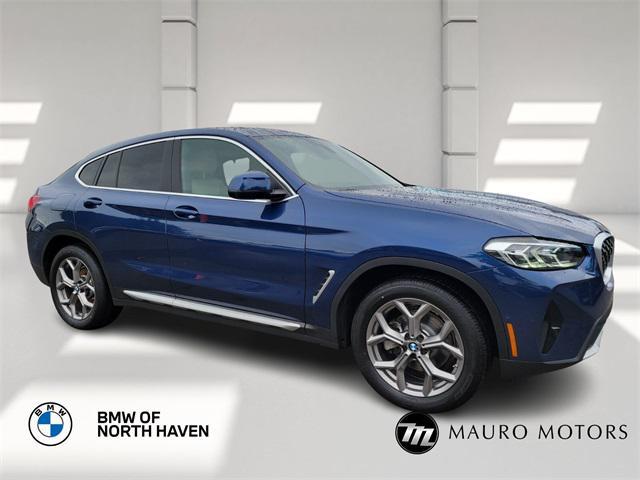 used 2022 BMW X4 car, priced at $39,877