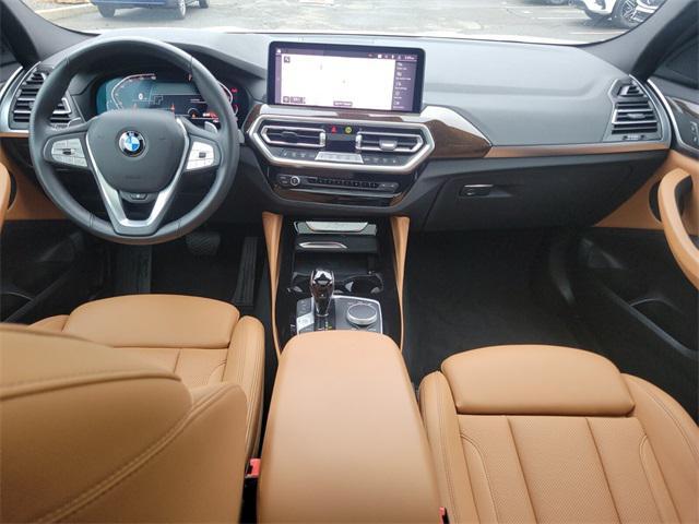 used 2024 BMW X4 car, priced at $43,997