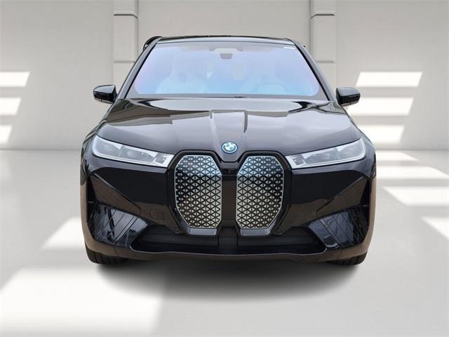 new 2024 BMW iX car, priced at $104,355