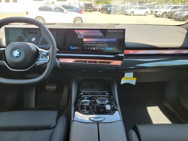 new 2026 BMW i5 car, priced at $77,475