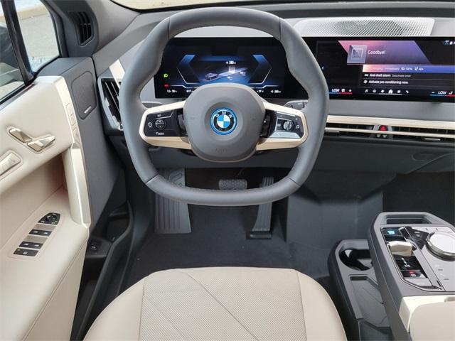 new 2024 BMW iX car, priced at $80,295