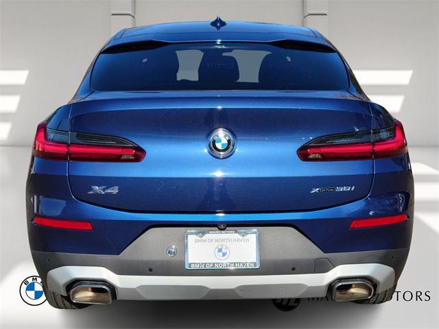 used 2022 BMW X4 car, priced at $38,999