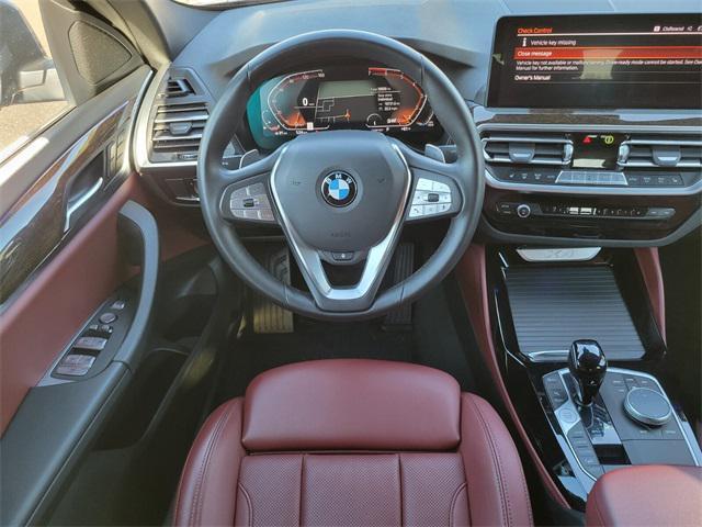 used 2022 BMW X4 car, priced at $38,999