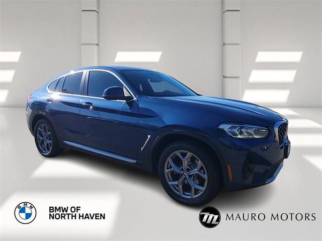 used 2022 BMW X4 car, priced at $38,999