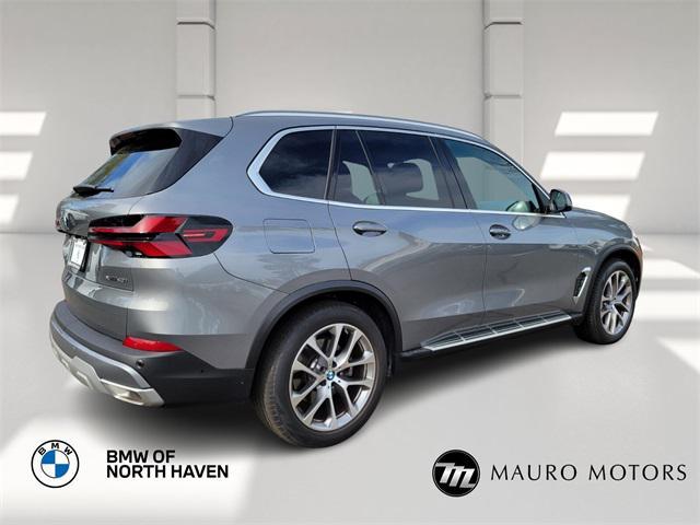 used 2025 BMW X5 car, priced at $67,997