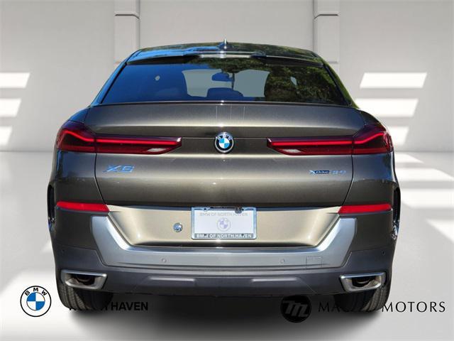 used 2023 BMW X6 car, priced at $42,997