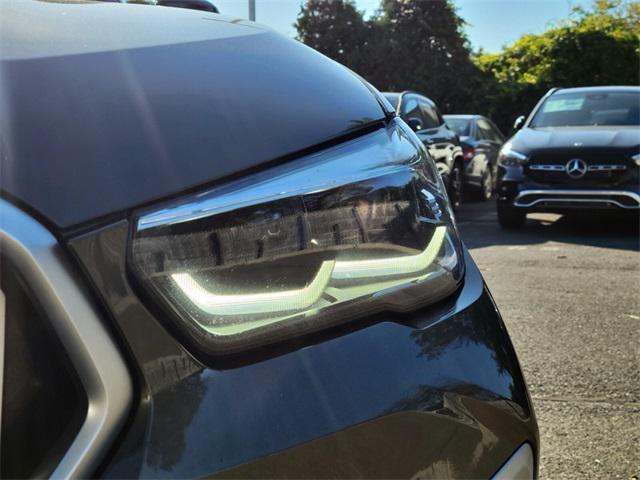 used 2023 BMW X6 car, priced at $42,997