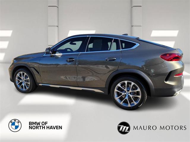 used 2023 BMW X6 car, priced at $42,997