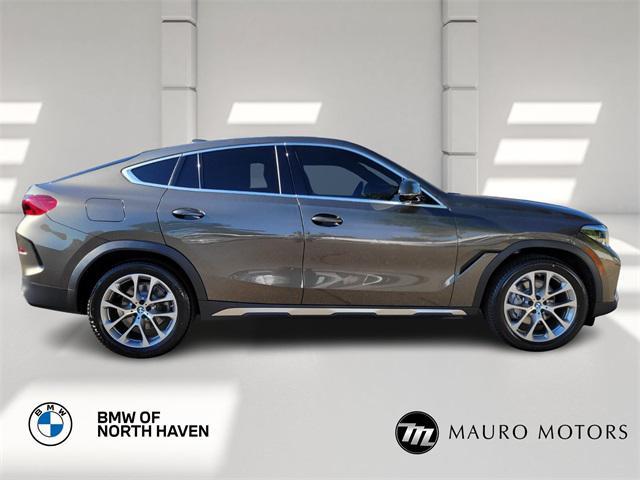 used 2023 BMW X6 car, priced at $42,997