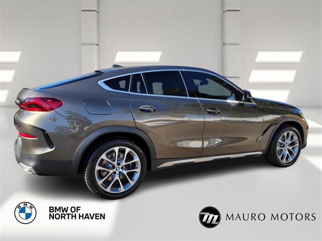 used 2023 BMW X6 car, priced at $42,997