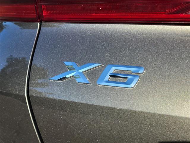 used 2023 BMW X6 car, priced at $42,997