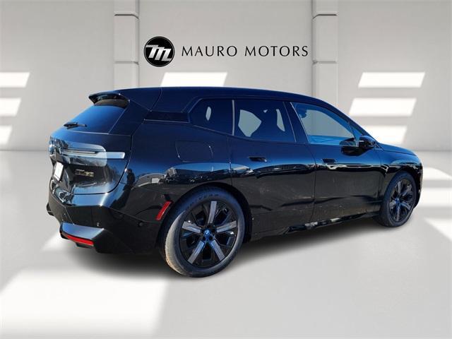 new 2024 BMW iX car, priced at $118,705