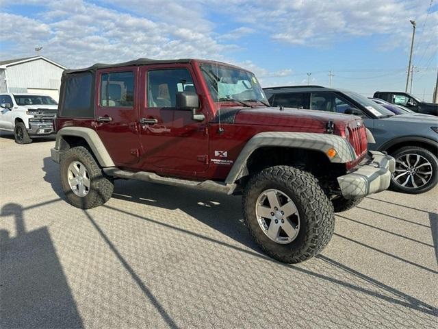used 2009 Jeep Wrangler Unlimited car, priced at $13,000