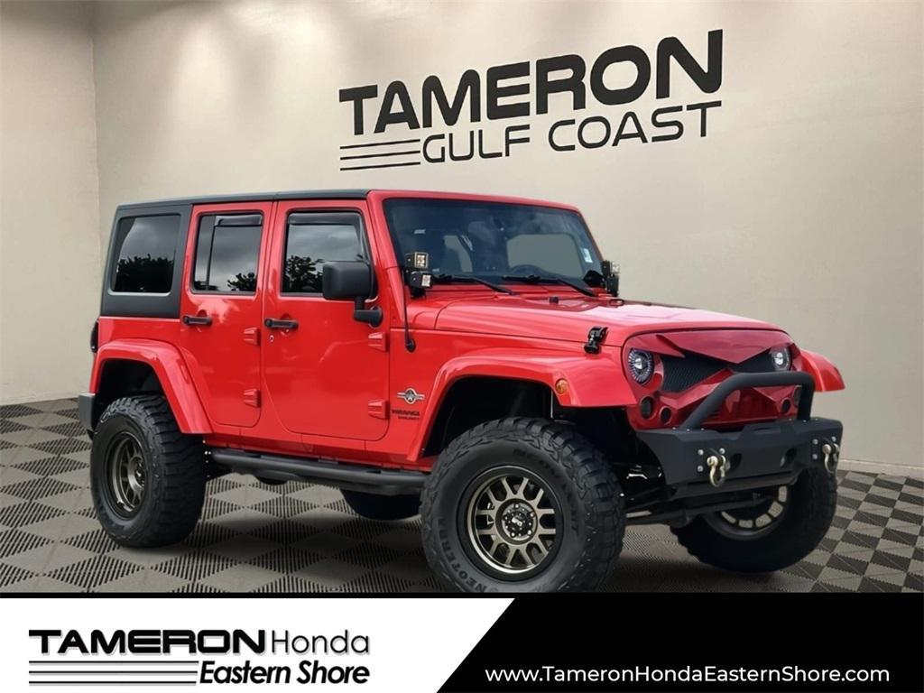 used 2015 Jeep Wrangler Unlimited car, priced at $16,672