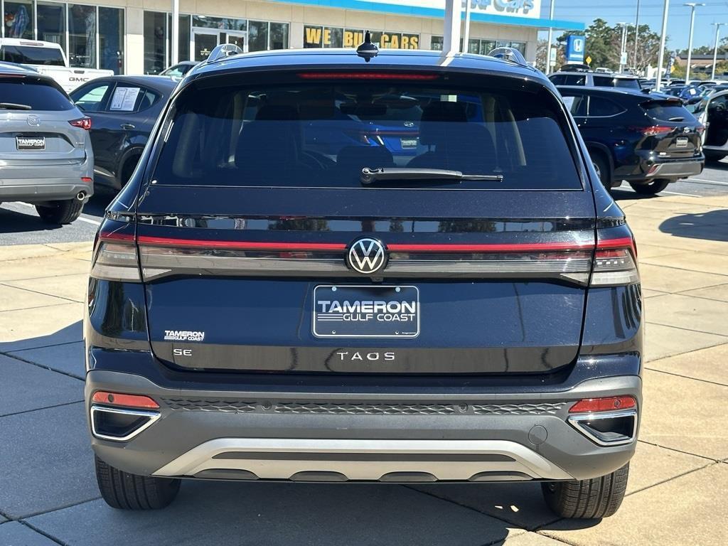 used 2025 Volkswagen Taos car, priced at $24,400