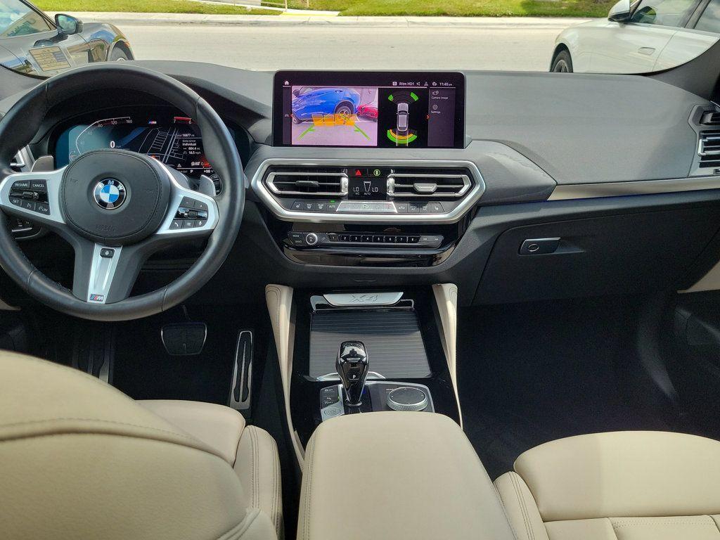 used 2023 BMW X4 car, priced at $48,817