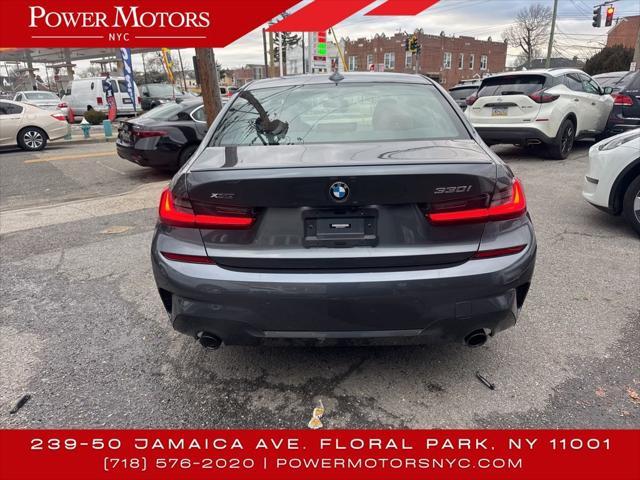 used 2022 BMW 330 car, priced at $26,673