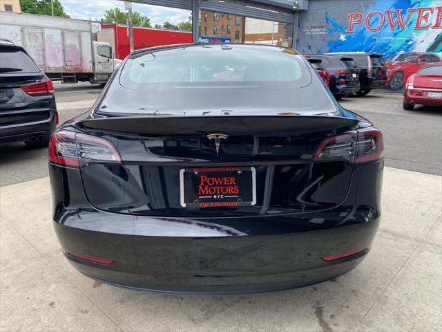 used 2023 Tesla Model 3 car, priced at $21,134