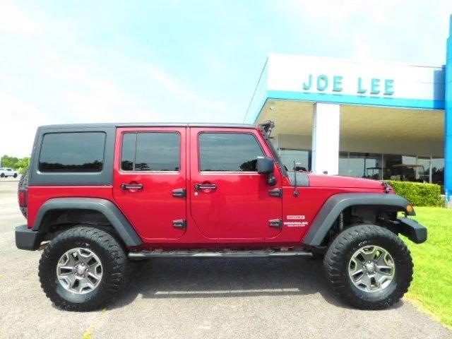 used 2013 Jeep Wrangler Unlimited car, priced at $15,877