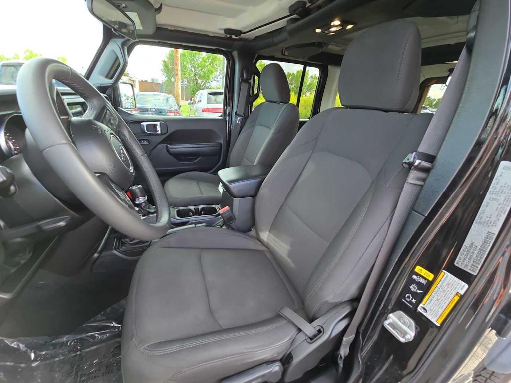 used 2023 Jeep Wrangler car, priced at $29,624