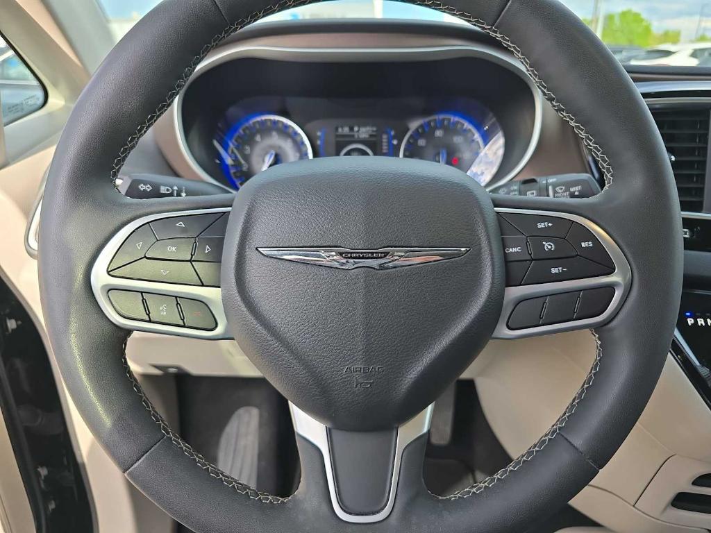 used 2023 Chrysler Voyager car, priced at $22,349
