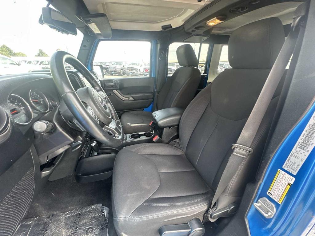 used 2015 Jeep Wrangler Unlimited car, priced at $19,745