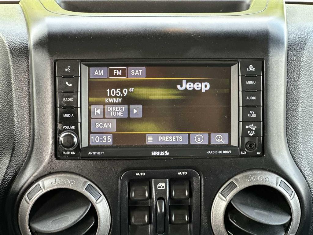 used 2015 Jeep Wrangler Unlimited car, priced at $19,745