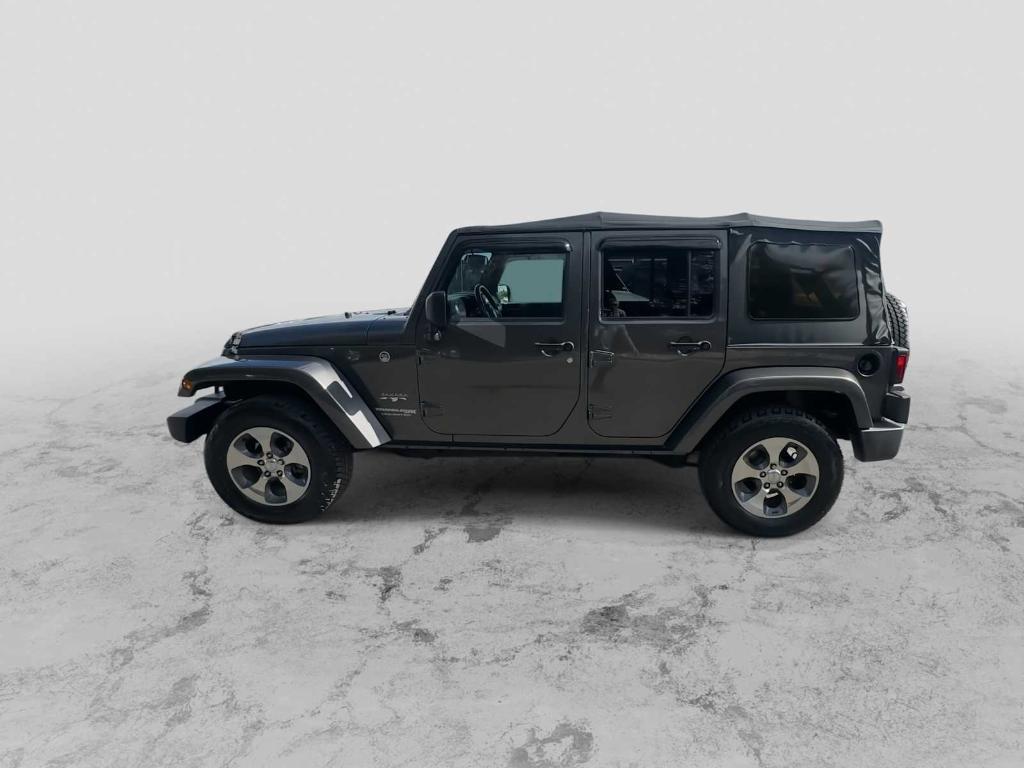 used 2018 Jeep Wrangler JK Unlimited car, priced at $23,852