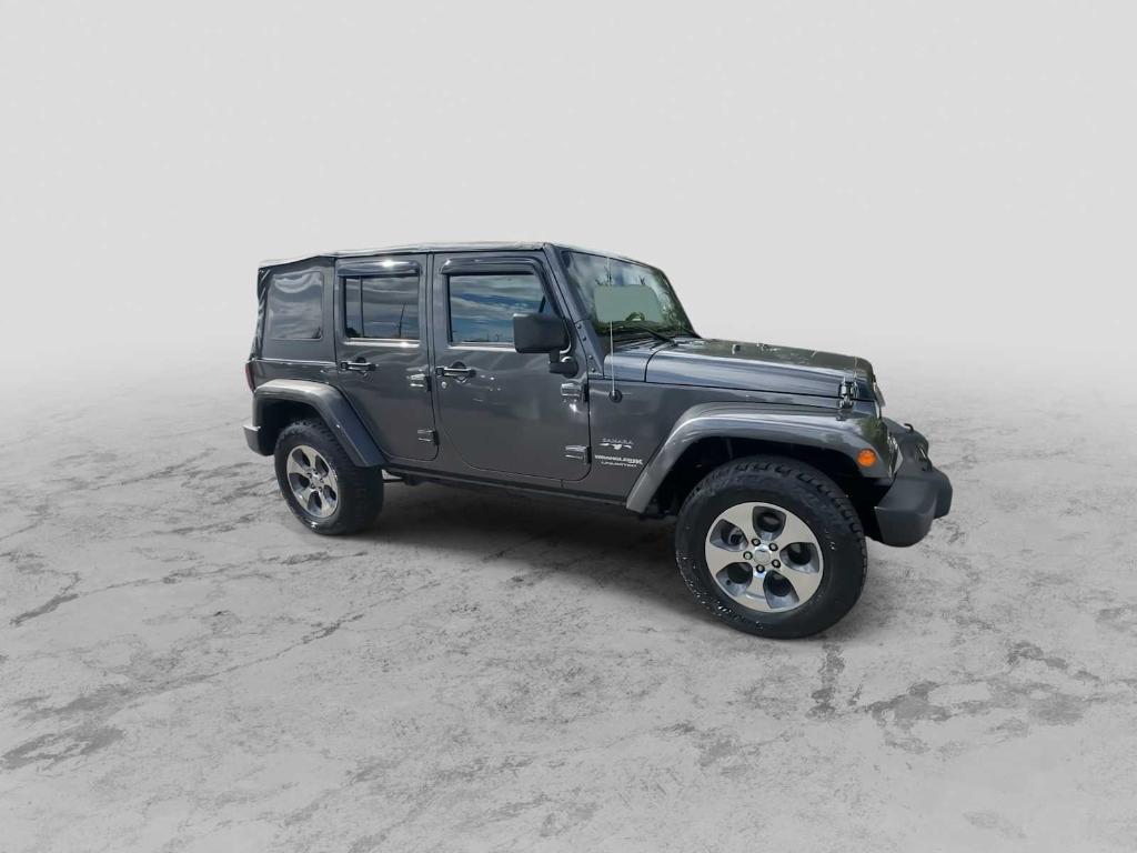 used 2018 Jeep Wrangler JK Unlimited car, priced at $23,852