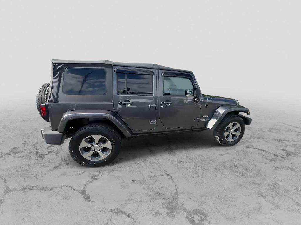 used 2018 Jeep Wrangler JK Unlimited car, priced at $23,852