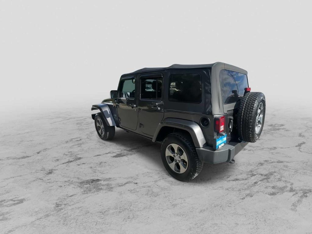 used 2018 Jeep Wrangler JK Unlimited car, priced at $23,852