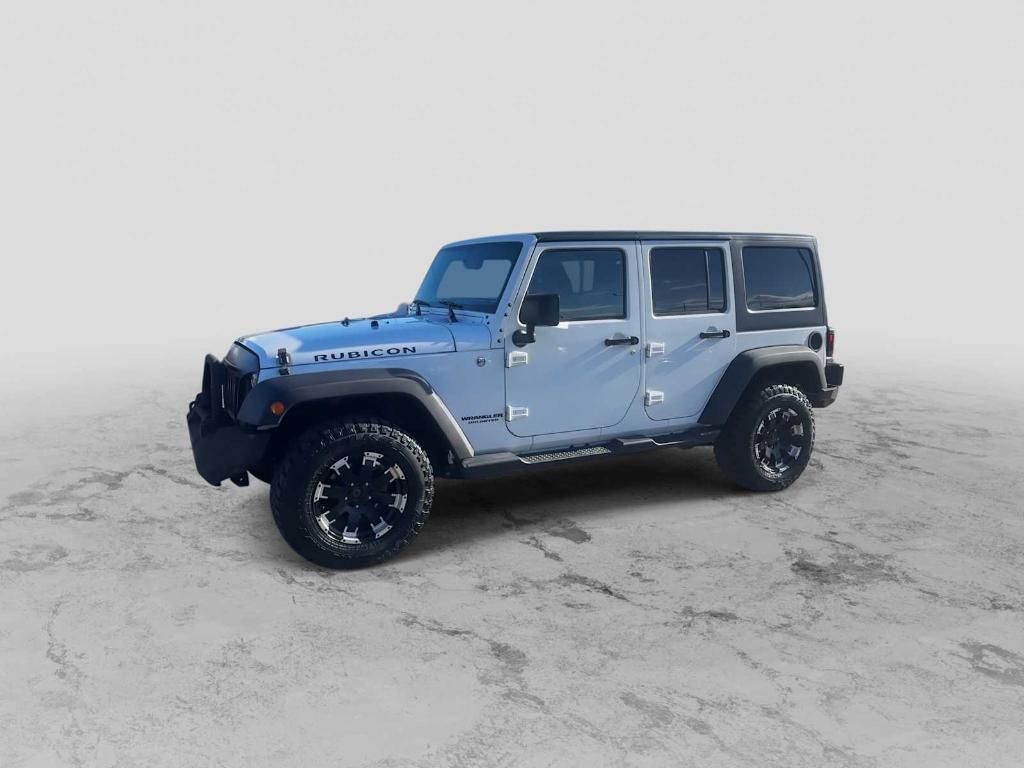 used 2015 Jeep Wrangler Unlimited car, priced at $16,004